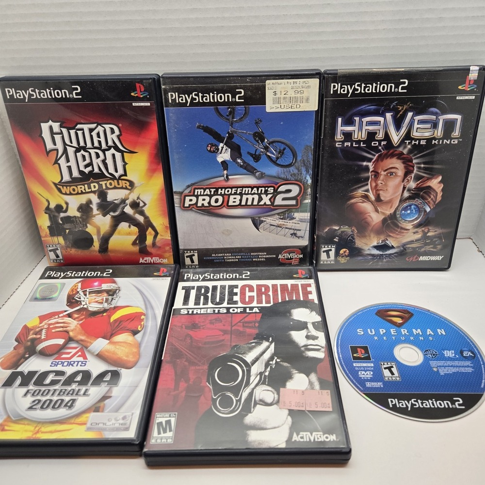 Six Sony PlayStation 2 PS2 Games Haven Pro BMX 2 True Crime Ncaa Guitar Hero